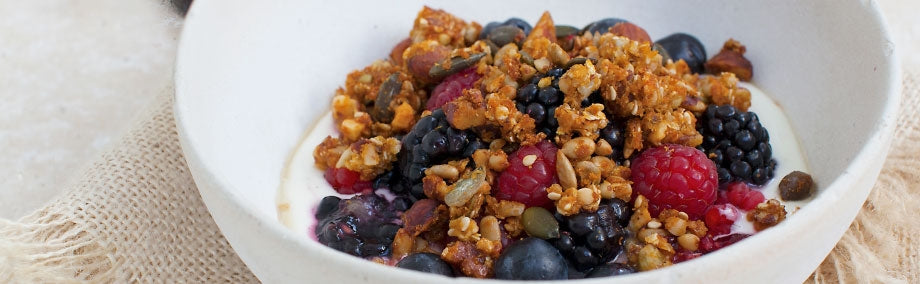 Ancient Grain Granola With Berry Yogurt & Udo's Oil Drizzle